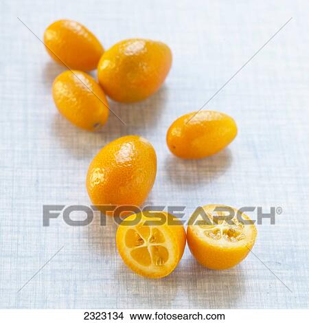 Picture - Close-up of slice of kumquats . Fotosearch