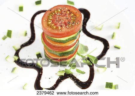 Close-up of stack of tomato and cucumber slices View Large Photo Image Stock Image - Close-up of stack of tomato and cucumber slices . Fotosearch