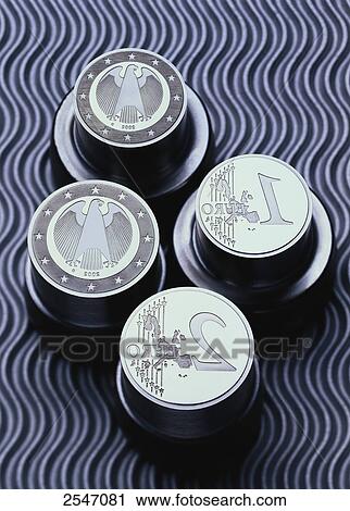 Stock Image - Close-up of stacks of euro coins . Fotosearch