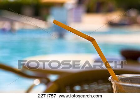 Close-up of straw in glass View Large Photo Image Stock Photo - Close-up of straw in glass . Fotosearch