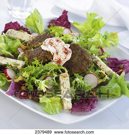 Close-up of veggie burgers with tofu and lettuce in tray View Large Photo Image Stock Photo - Close-up of veggie burgers with tofu and lettuce in tray . Fotosearch