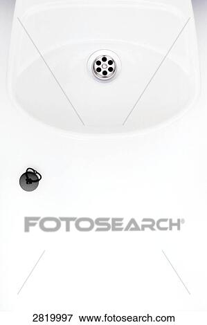 Close-up of washbowl with cap View Large Photo Image Stock Photo - Close-up of washbowl with cap . Fotosearch