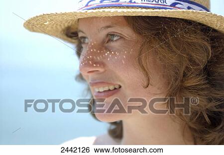 Stock Photograph - Close-up of woman thinking . Fotosearch