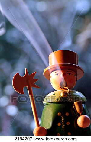 Close-up of wooden figurine View Large Photo Image Stock Photo - Close-up of wooden figurine . Fotosearch