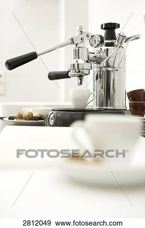 Stock Photo - Coffee maker in kitchen . Fotosearch