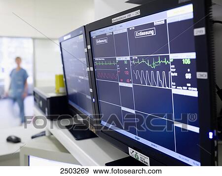 Stock Photo - Computers used during surgery showing heart rate . Fotosearch