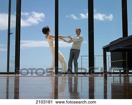 Couple dancing at balcony View Large Photo Image Stock Image - Couple dancing at balcony . Fotosearch