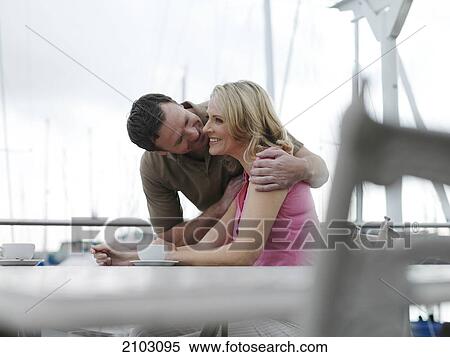 Couple smiling at table View Large Photo Image Stock Photography - Couple smiling at table . Fotosearch
