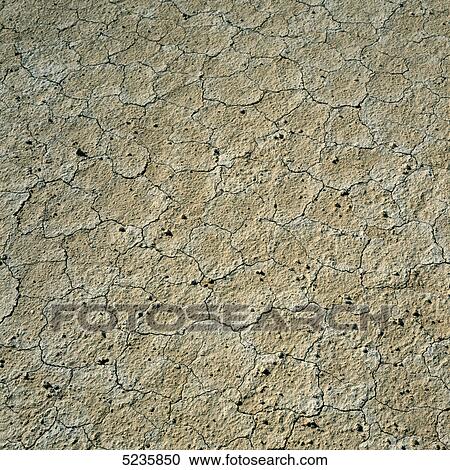 Cracked earth View Large Photo Image Stock Image - Cracked earth . Fotosearch