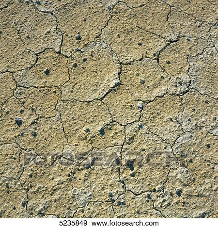 Cracked earth View Large Photo Image Stock Photo - Cracked earth . Fotosearch