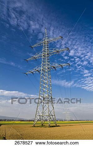 Stock Photo - Electricity pylon in field . Fotosearch