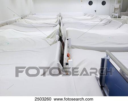 Stock Image - Empty beds in hospital . Fotosearch