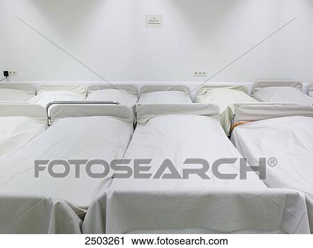 Empty beds in hospital View Large Photo Image Stock Image - Empty beds in hospital . Fotosearch