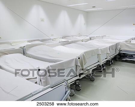 Stock Photo - Empty beds in hospital . Fotosearch