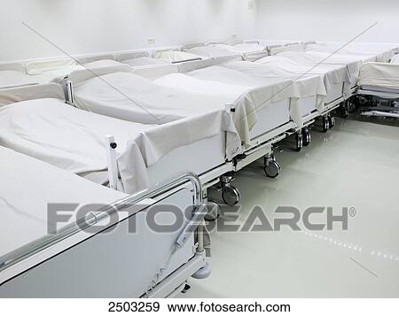 Empty beds in hospital View Large Photo Image Stock Photo - Empty beds in hospital . Fotosearch