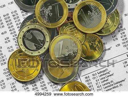 Stock Photo - European coins and share prices . Fotosearch