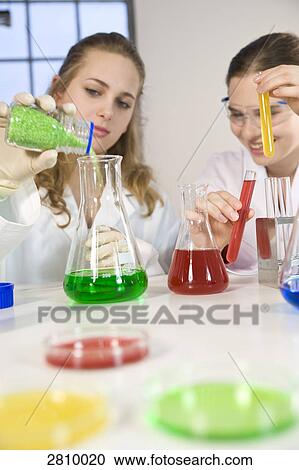 Female students doing experiment in chemistry laboratory View Large Photo Image Stock Image - Female students doing experiment in chemistry laboratory . Fotosearch