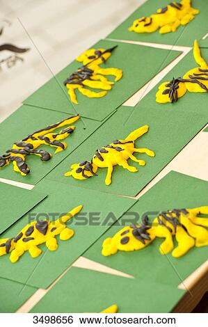 Stock Photograph - Figures made out of plasticine, close-up . Fotosearch