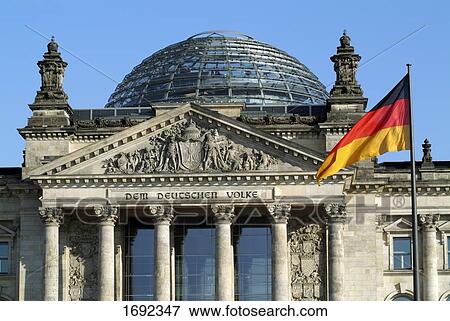 German flag fluttering in front of government building, Reichstag, Berlin, Germany View Large Photo Image Stock Photo - German flag fluttering in front of government building, Reichstag, Berlin, Germany . Fotosearch