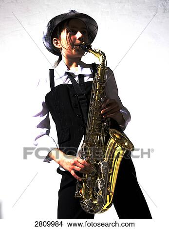 Picture - Girl playing saxophone . Fotosearch