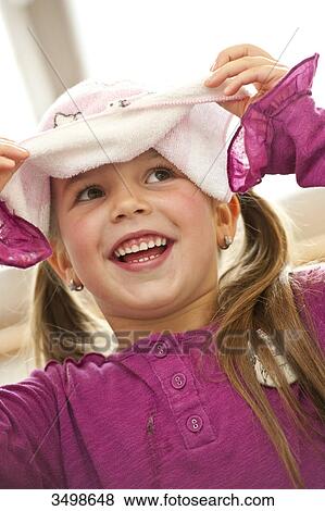 Stock Photo - Girl with towel on her head . Fotosearch