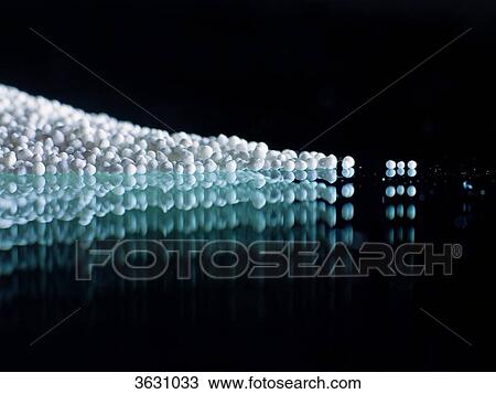 Globules on black surface, close-up View Large Photo Image Stock Image - Globules on black surface, close-up . Fotosearch