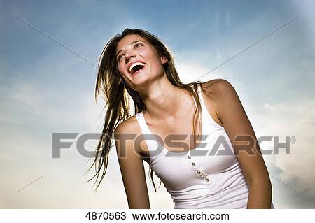 Happy young woman outdoors View Large Photo Image Stock Image - Happy young woman outdoors . Fotosearch