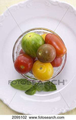 Stock Image - High angle view of fruits in bowl . Fotosearch