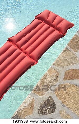 High angle view of inflatable raft in swimming pool View Large Photo Image Stock Photo - High angle view of inflatable raft in swimming pool . Fotosearch