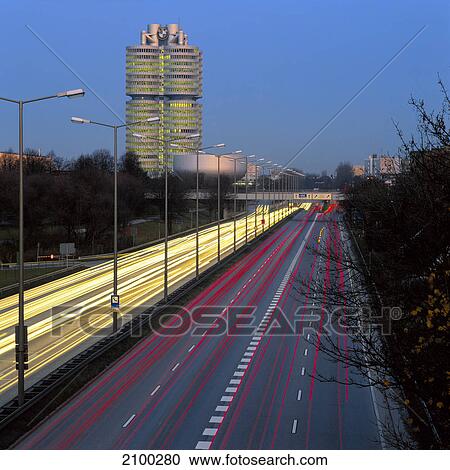 Stock Image - High angle view of traffic in motion at dusk, Germany . Fotosearch