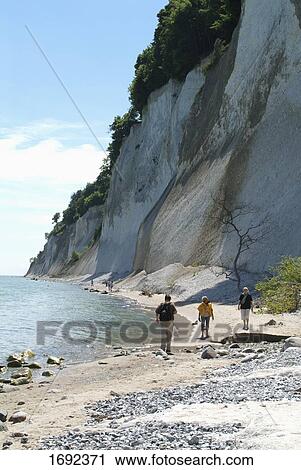 Hikers walking at coast View Large Photo Image Stock Image - Hikers walking at coast . Fotosearch
