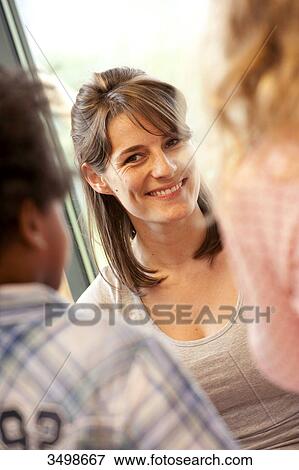 Stock Photo - Kindergarten teacher and children . Fotosearch