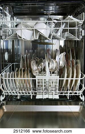 Kitchen utensils in dishwasher View Large Photo Image Stock Photograph - Kitchen utensils in dishwasher . Fotosearch