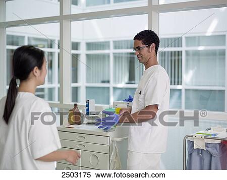 Stock Photography - Lab technicians working in lab . Fotosearch