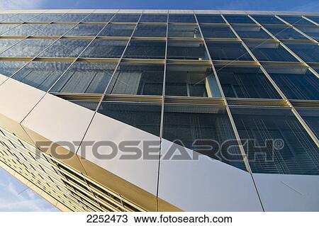 Low angle view of office building View Large Photo Image Stock Image - Low angle view of office building . Fotosearch
