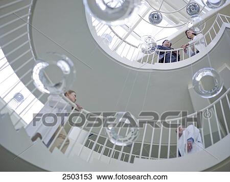 Low angle view of spiral staircase in hospital View Large Photo Image Stock Image - Low angle view of spiral staircase in hospital . Fotosearch