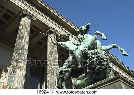 Stock Photo - Low angle view of statue of horse rider . Fotosearch