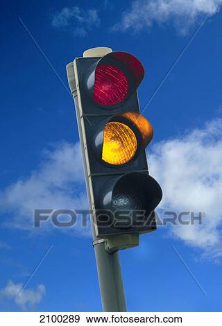 Stock Photo - Low angle view of stoplight . Fotosearch