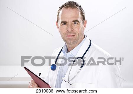 Male doctor with stethoscope in his neck View Large Photo Image Stock Photograph - Male doctor with stethoscope in his neck . Fotosearch