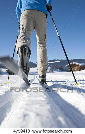 Man cross-country skiing, Tannheimer Tal, Tyrol, Austria View Large Photo Image Stock Image - Man cross-country skiing, Tannheimer Tal, Tyrol, Austria . Fotosearch