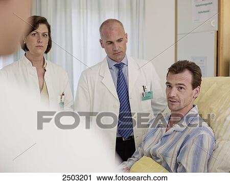 man having a chat with doctors View Large Photo Image Stock Image - man having a chat with doctors . Fotosearch