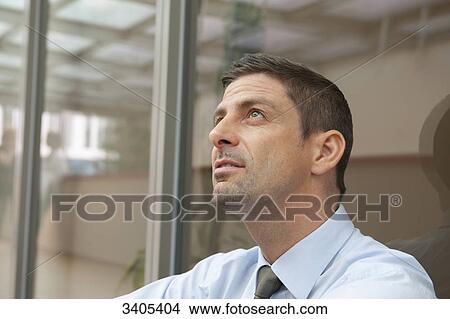 Man looking up View Large Photo Image Picture - Man looking up . Fotosearch