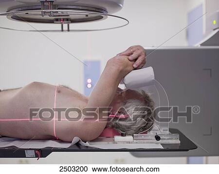 man lying under a x-ray View Large Photo Image Stock Image - man lying under a x-ray . Fotosearch