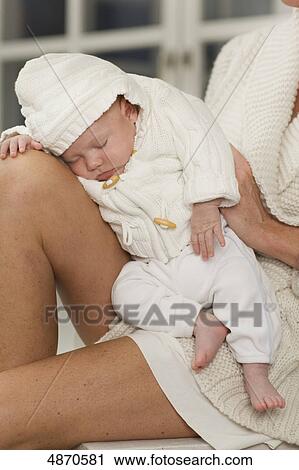 Mother holding baby View Large Photo Image Stock Image - Mother holding baby . Fotosearch