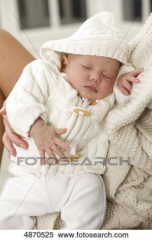 Stock Photography - Mother holding baby . Fotosearch
