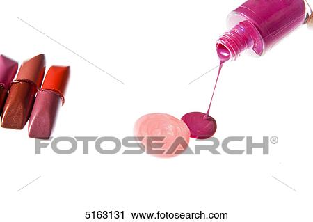 Stock Image - Nail varnish and lipstick . Fotosearch