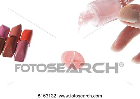 Stock Image - Nail varnish and lipstick . Fotosearch