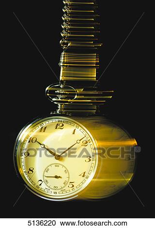 Stock Image - Open-face watch on the move . Fotosearch