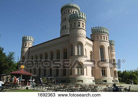 Stock Image - Outdoor cafe in front of museum . Fotosearch