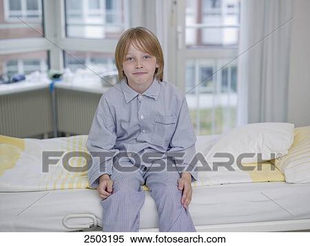 Patient sitting on hospital bed View Large Photo Image Stock Photography - Patient sitting on hospital bed . Fotosearch